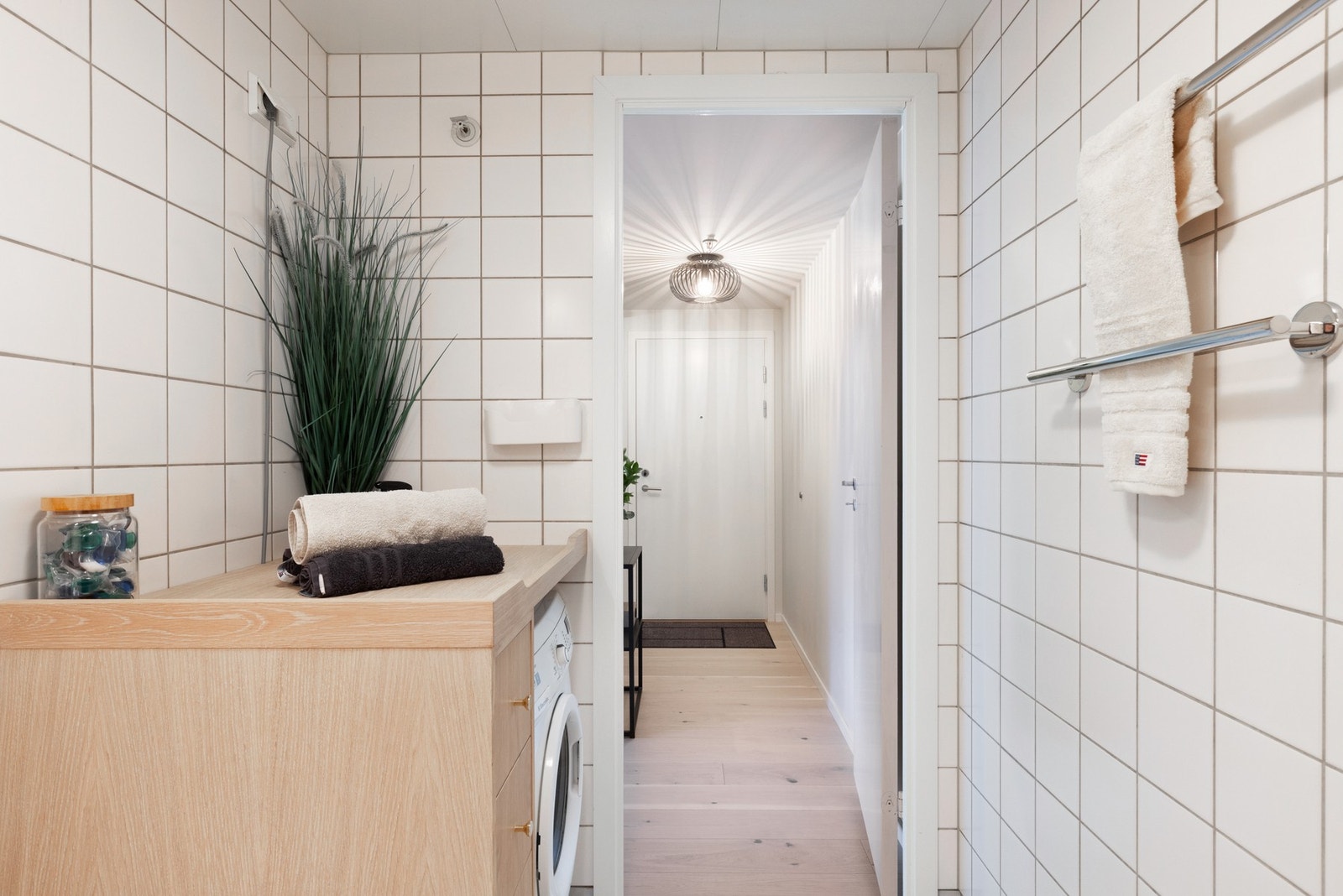 Badet har opplegg for vaskemaskin. Galleribilde