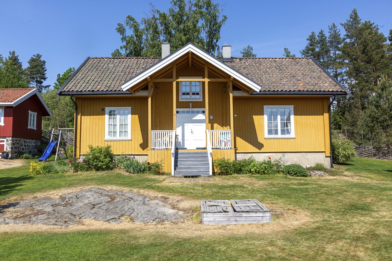 Det gule huset er på ca. 125 kvm. Galleribilde