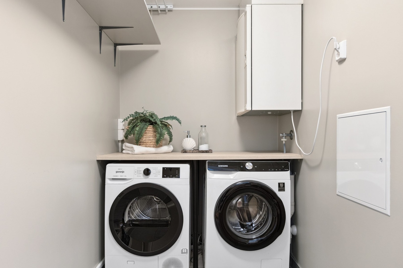 Boligen har et eget separat vaskerom. Galleribilde