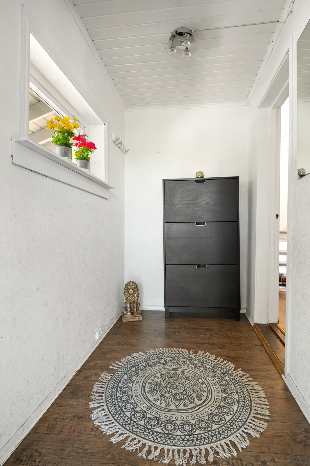 Entré hvor det er plass til å sko og jakker. Galleribilde