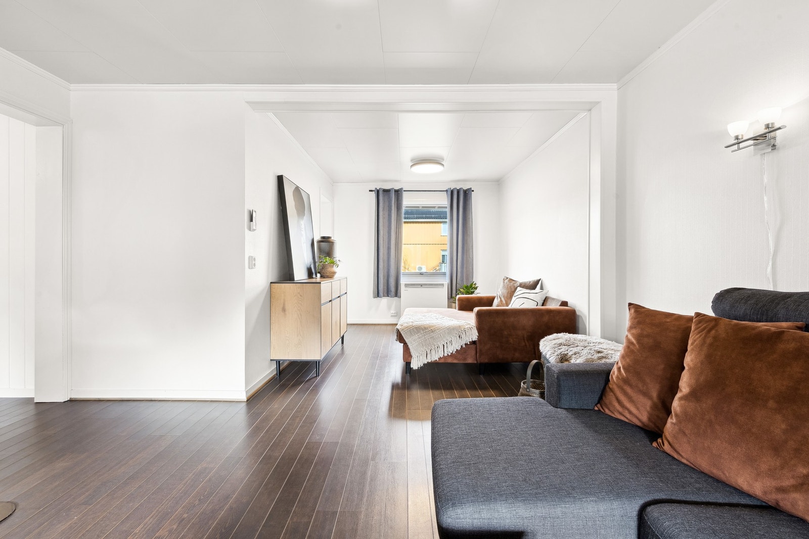 Fra hovedstuen får du tilgang til en koselig sittekrok. Galleribilde