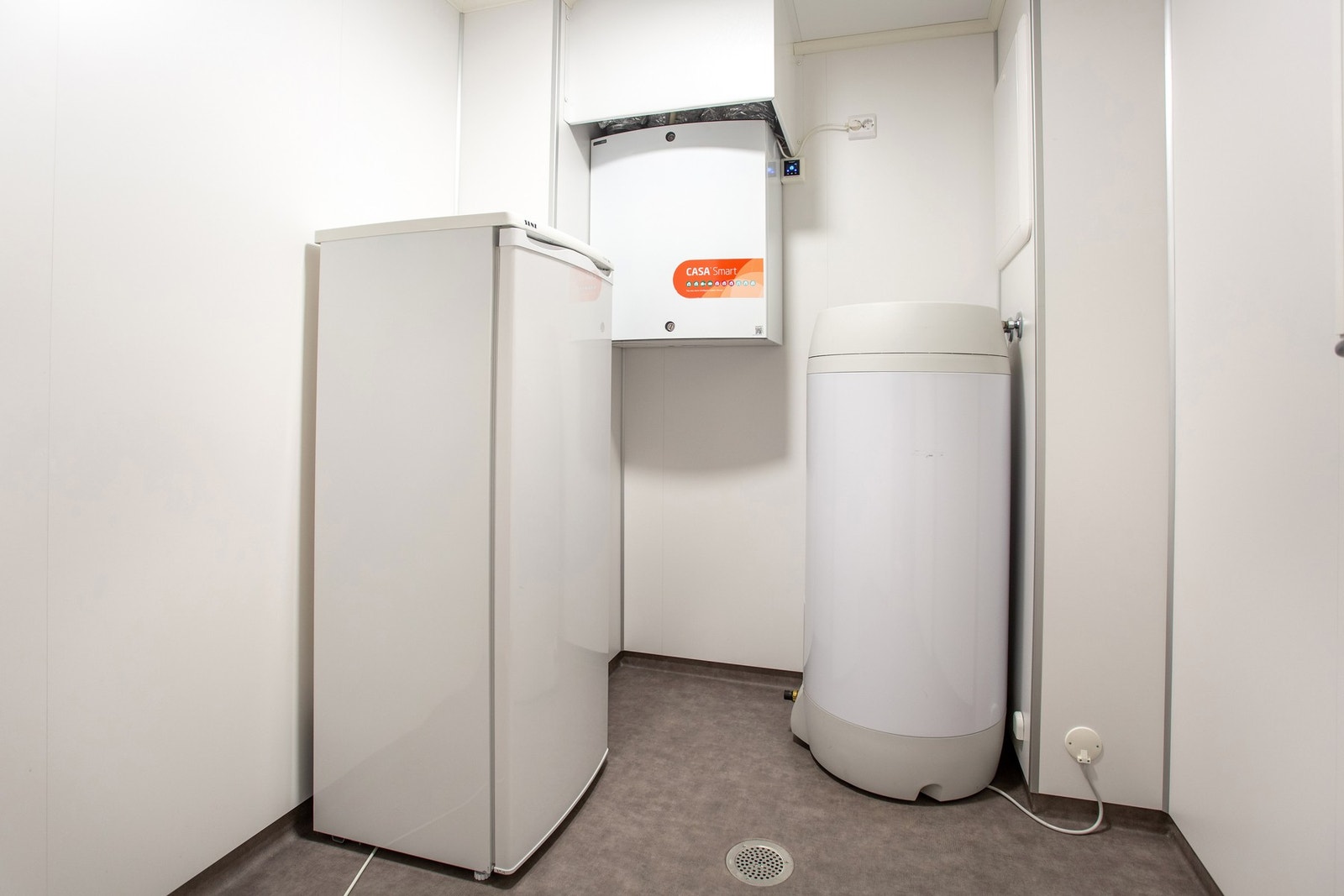 Tekniskrom med sluk og belegg på gulv. Galleribilde