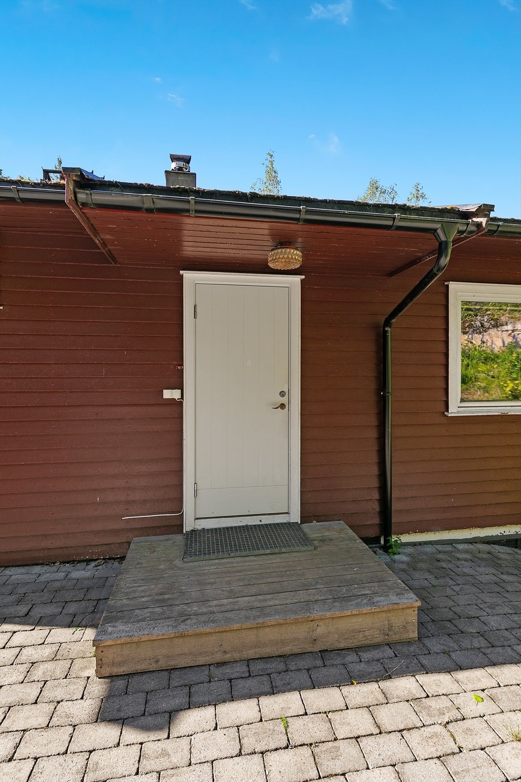 Inngangspartiet på baksiden av huset Galleribilde