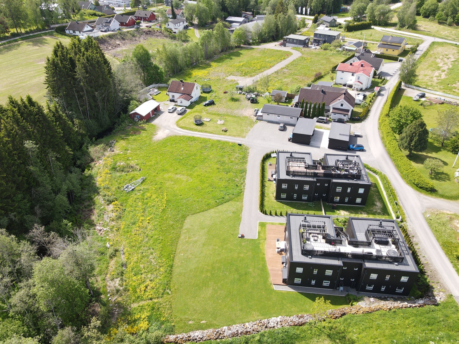 Oversikt av tomte nr 9-12 i fremste rekke og tomte nr 1-8 lengst bak Galleribilde