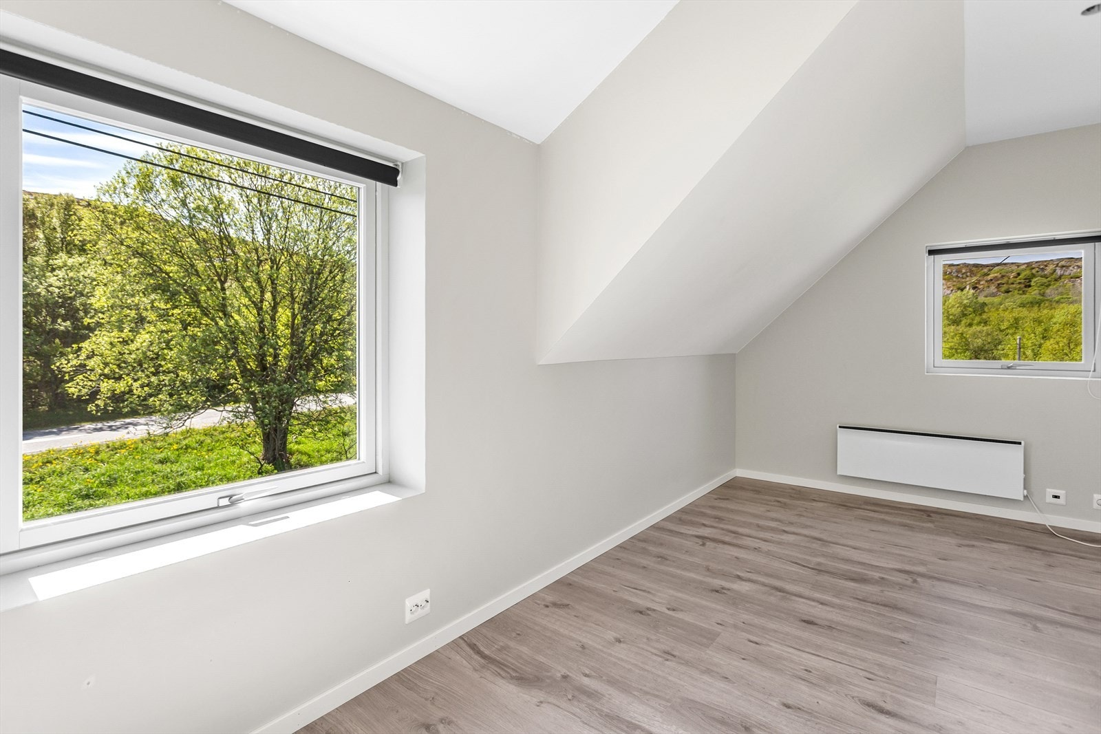 Det er fire soverom på loftet, alle med gipsbelagte overflater og laminatgulv Galleribilde