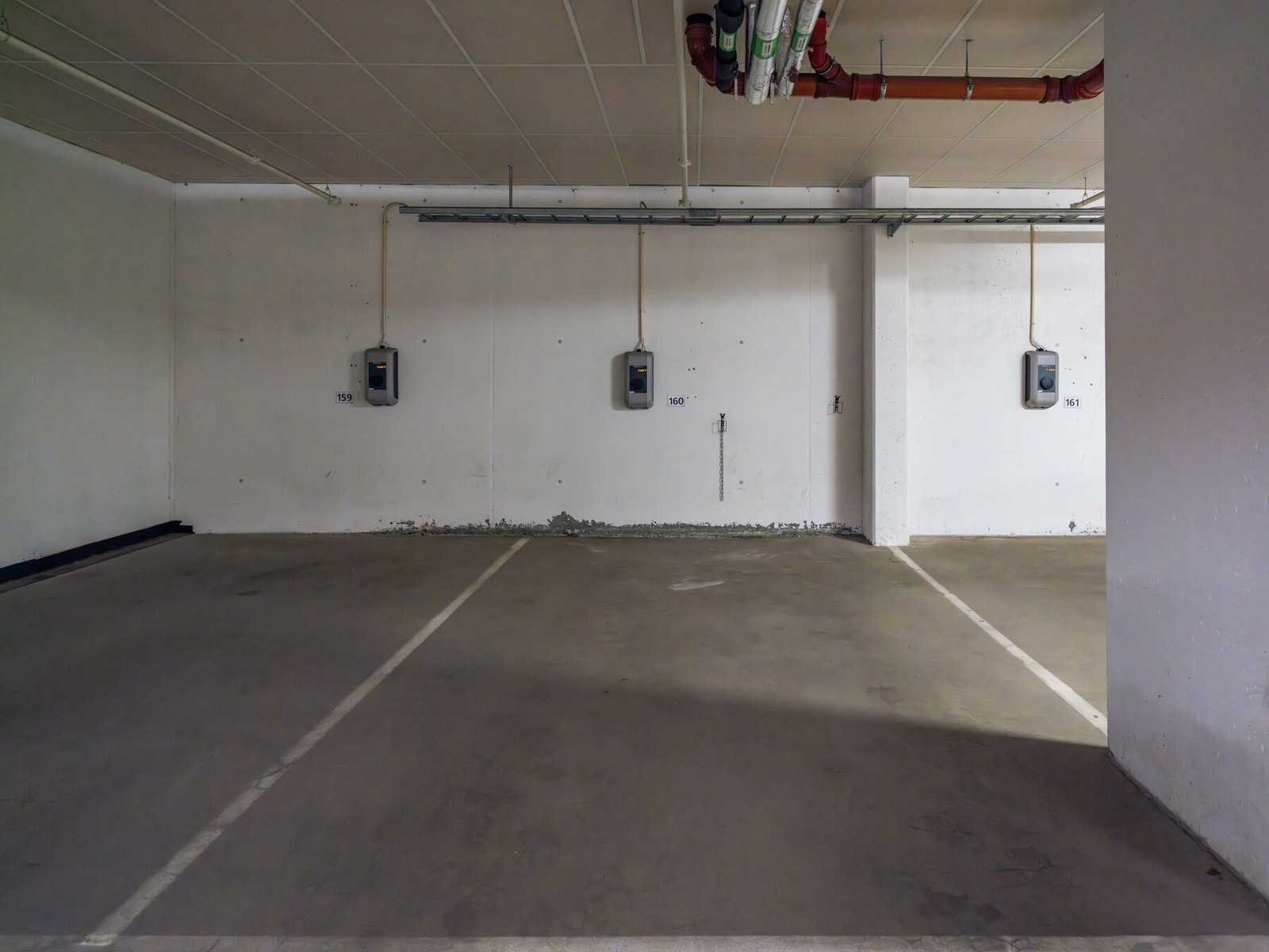 Heisen fører deg opp til leilighetsplan og ned til garasjeanlegget, en praktisk egenskap heiser ofte har. Galleribilde