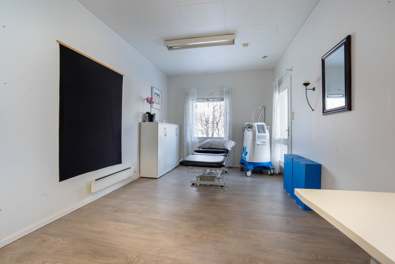 Behandlingsrom 3 med utgang Galleribilde