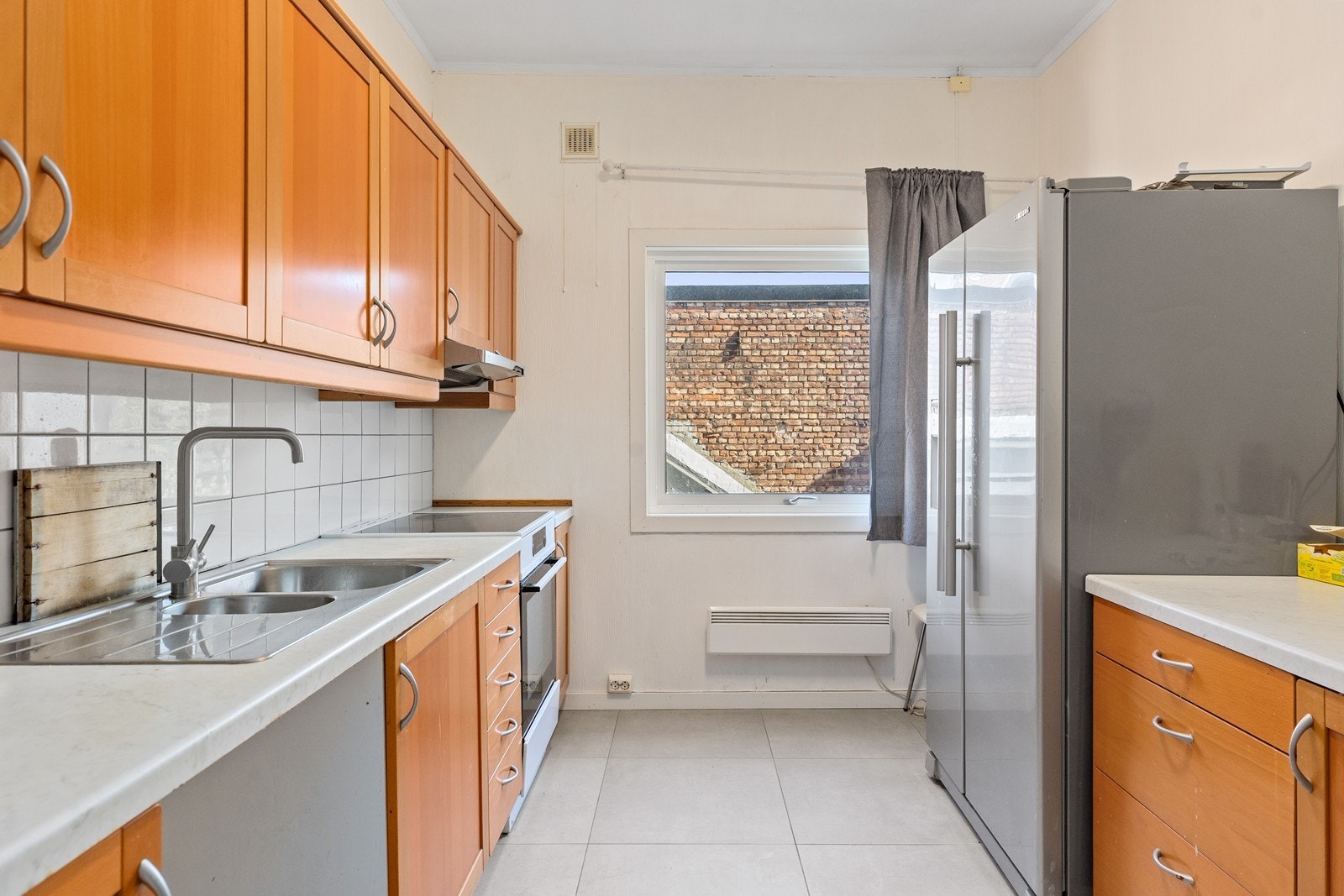 Kjøkken i en av leilighetene Galleribilde