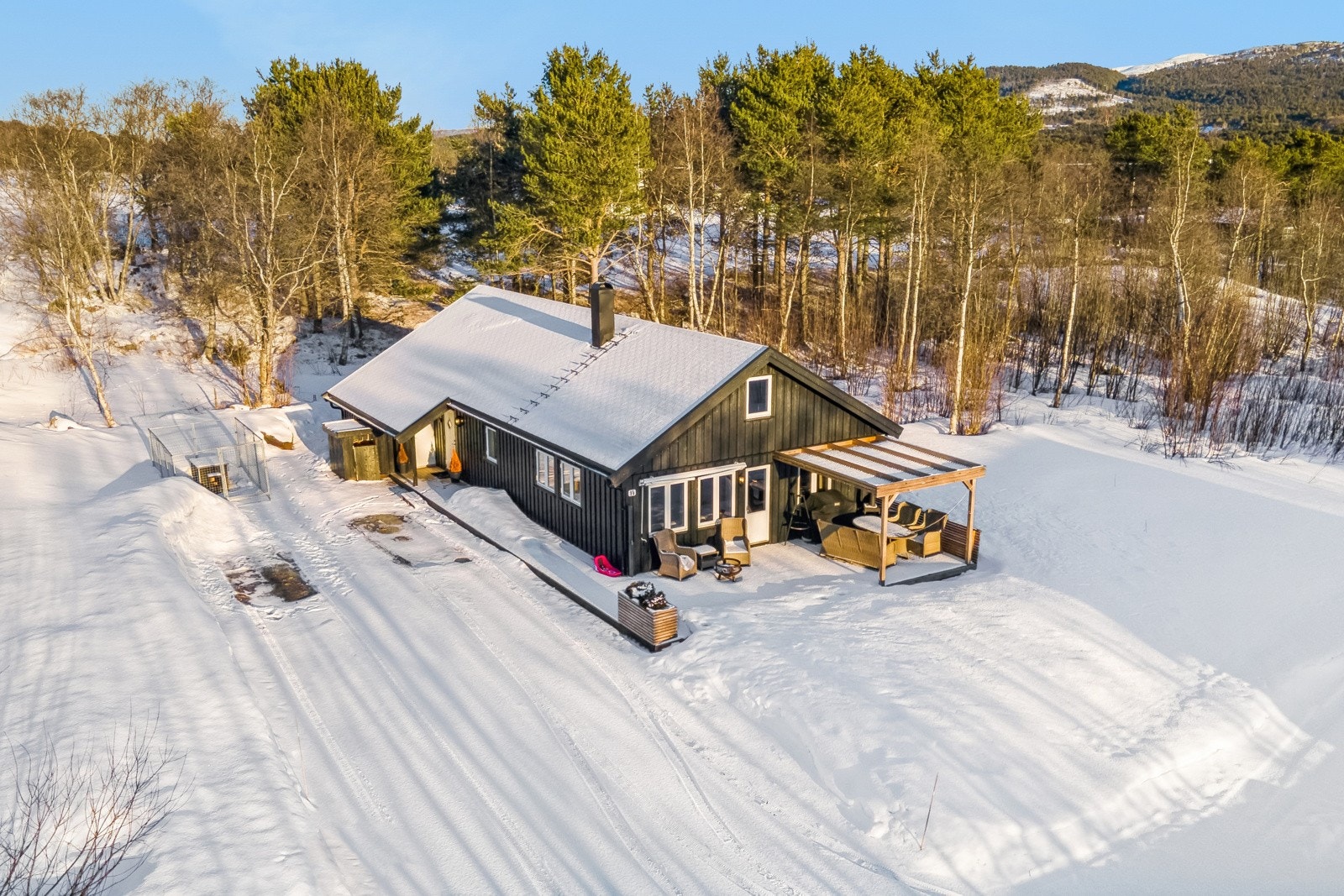 Hytta har nær ski-in/ski-out-beliggenhet. Galleribilde
