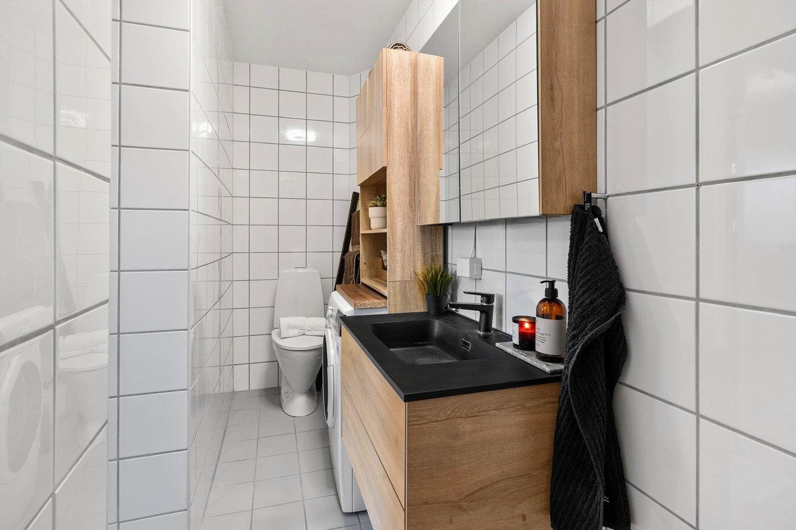 Flislagt bad fra 2003 med varmekabler i gulv. Galleribilde