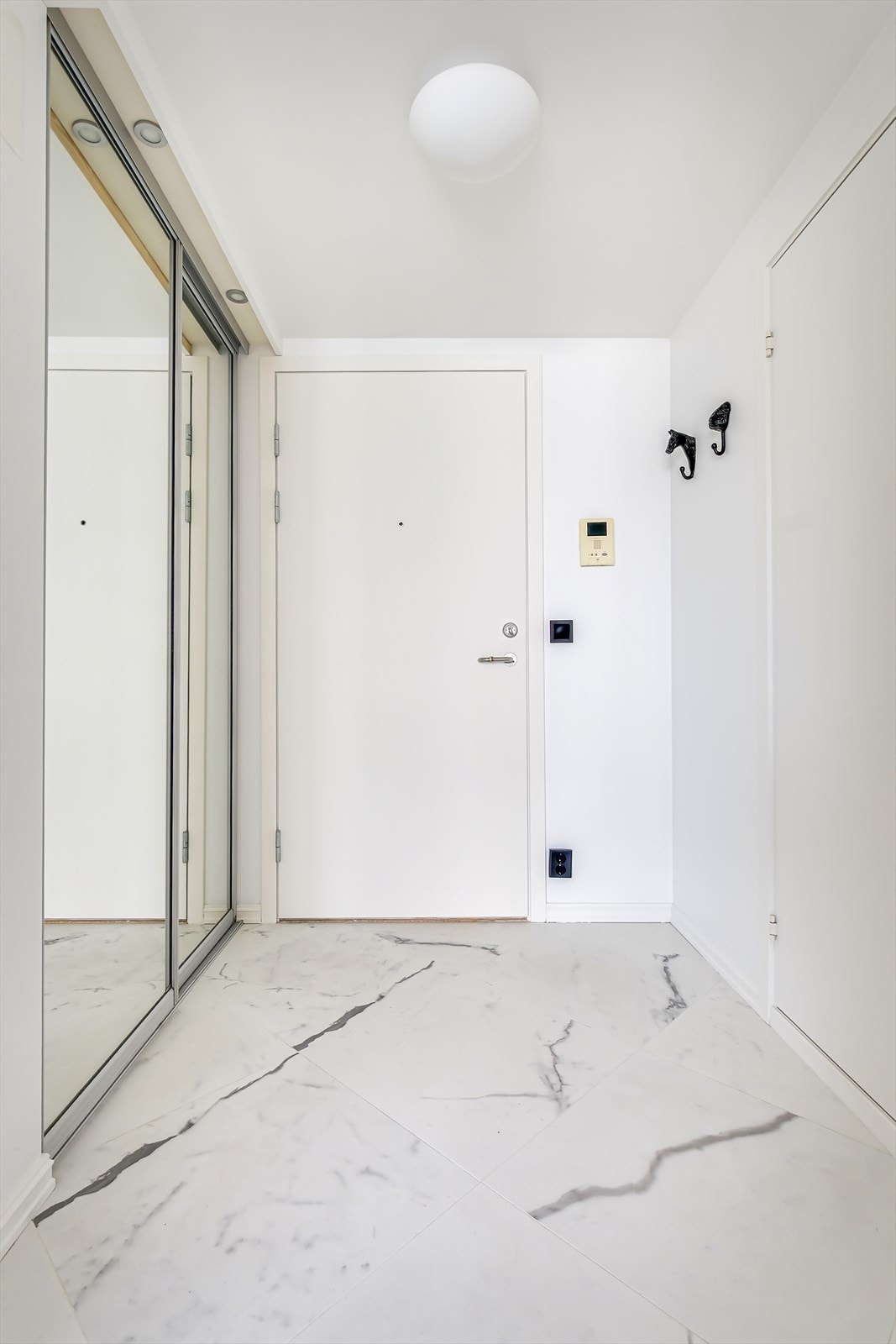 En hyggelig entré ønsker deg velkommen hjem. Galleribilde