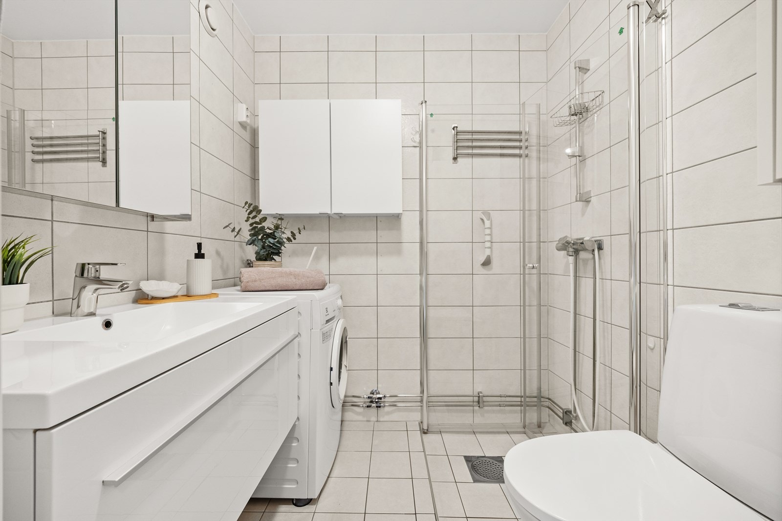 Flislagt bad renovert i regi av borettslaget i 2018 Galleribilde