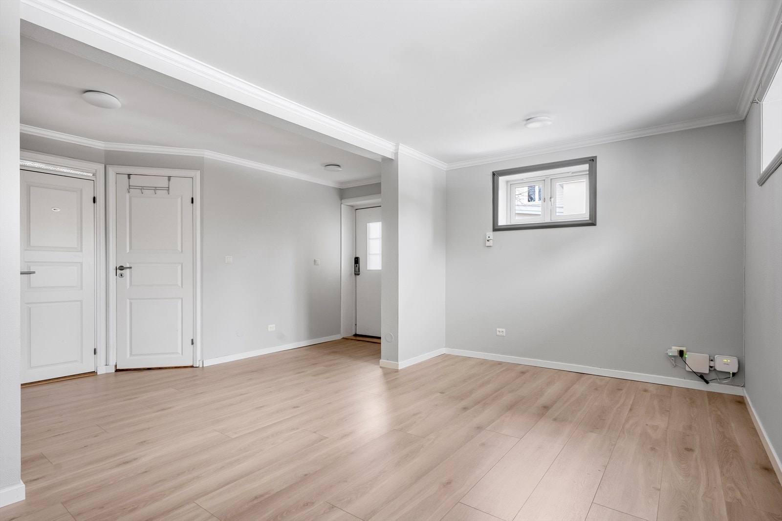 I den ene enden av det åpne rommet er det plass til sofakrok med uttak i vegg. Galleribilde