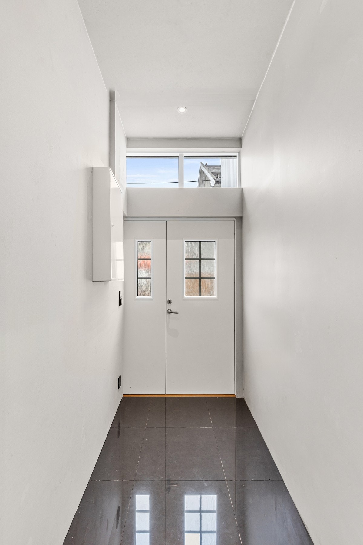 Entréen har varmekabler i gulv Galleribilde