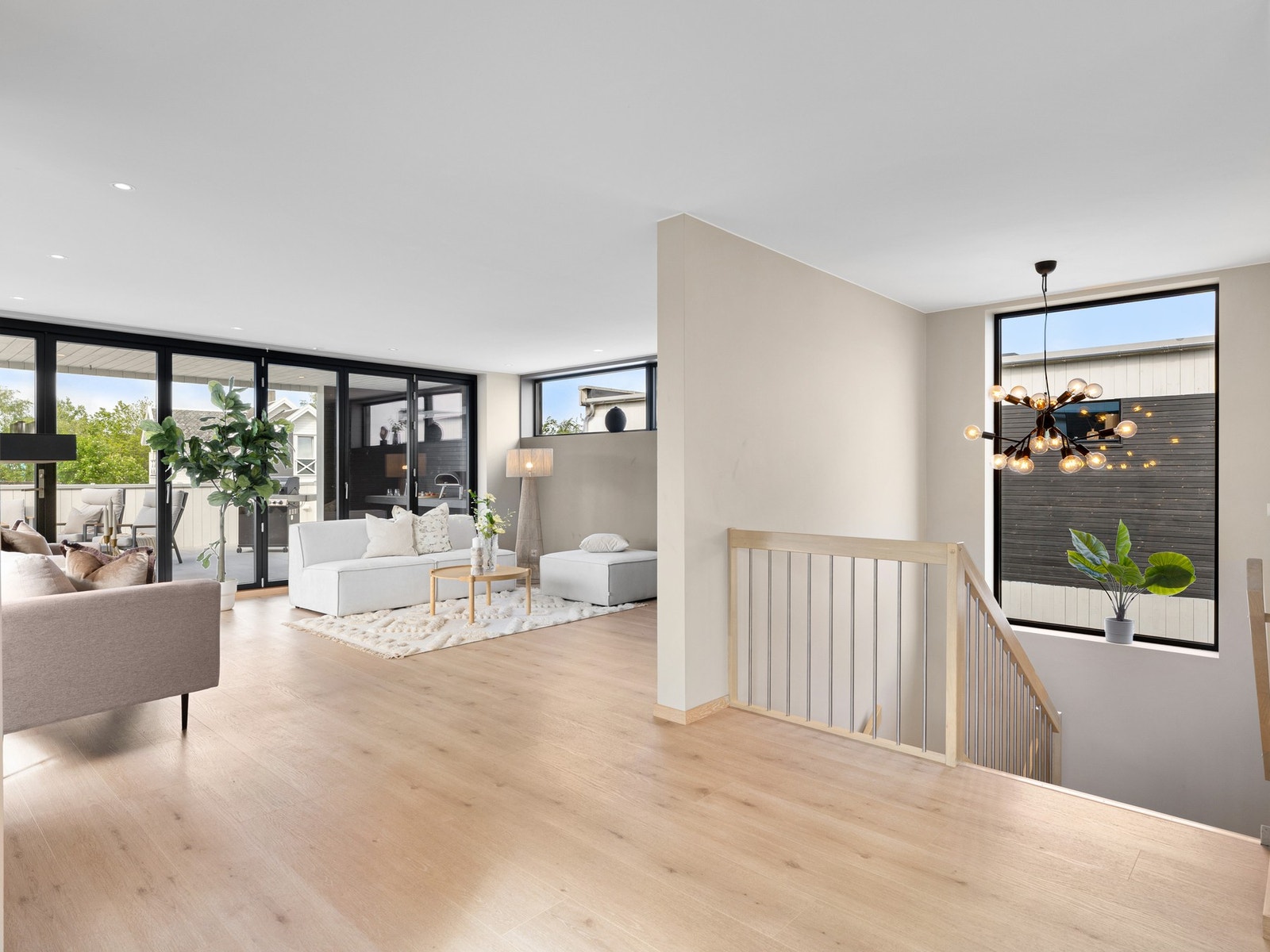 Stue med foldedør til takterrasse Galleribilde