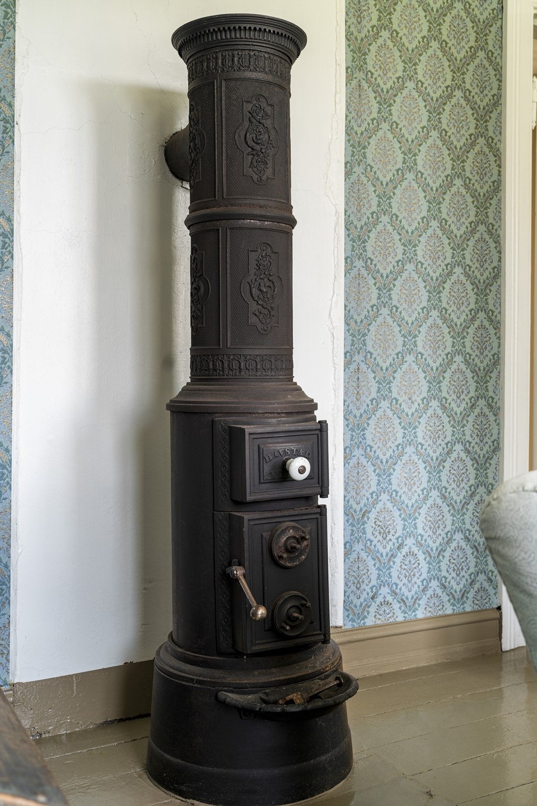 Rundovnen på loftstuen er en av de pene ildstedene Galleribilde