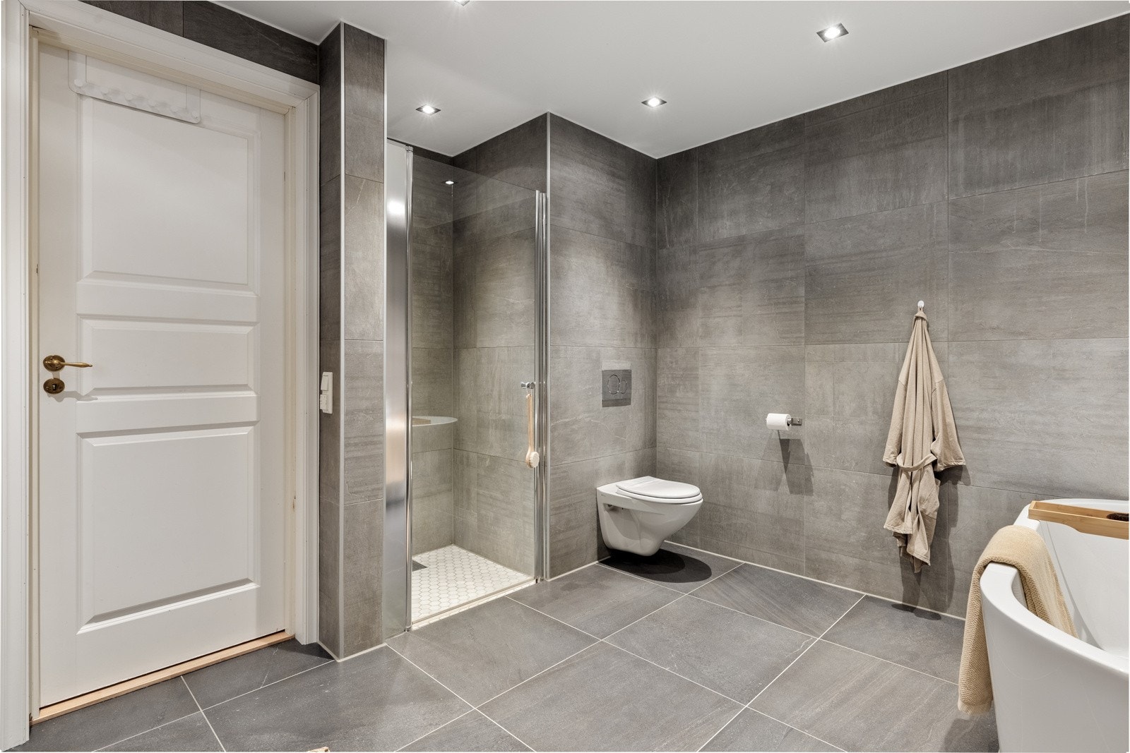 Fra badet er det tilkomst til et praktisk vaskerom på 2,7 kvm. Galleribilde