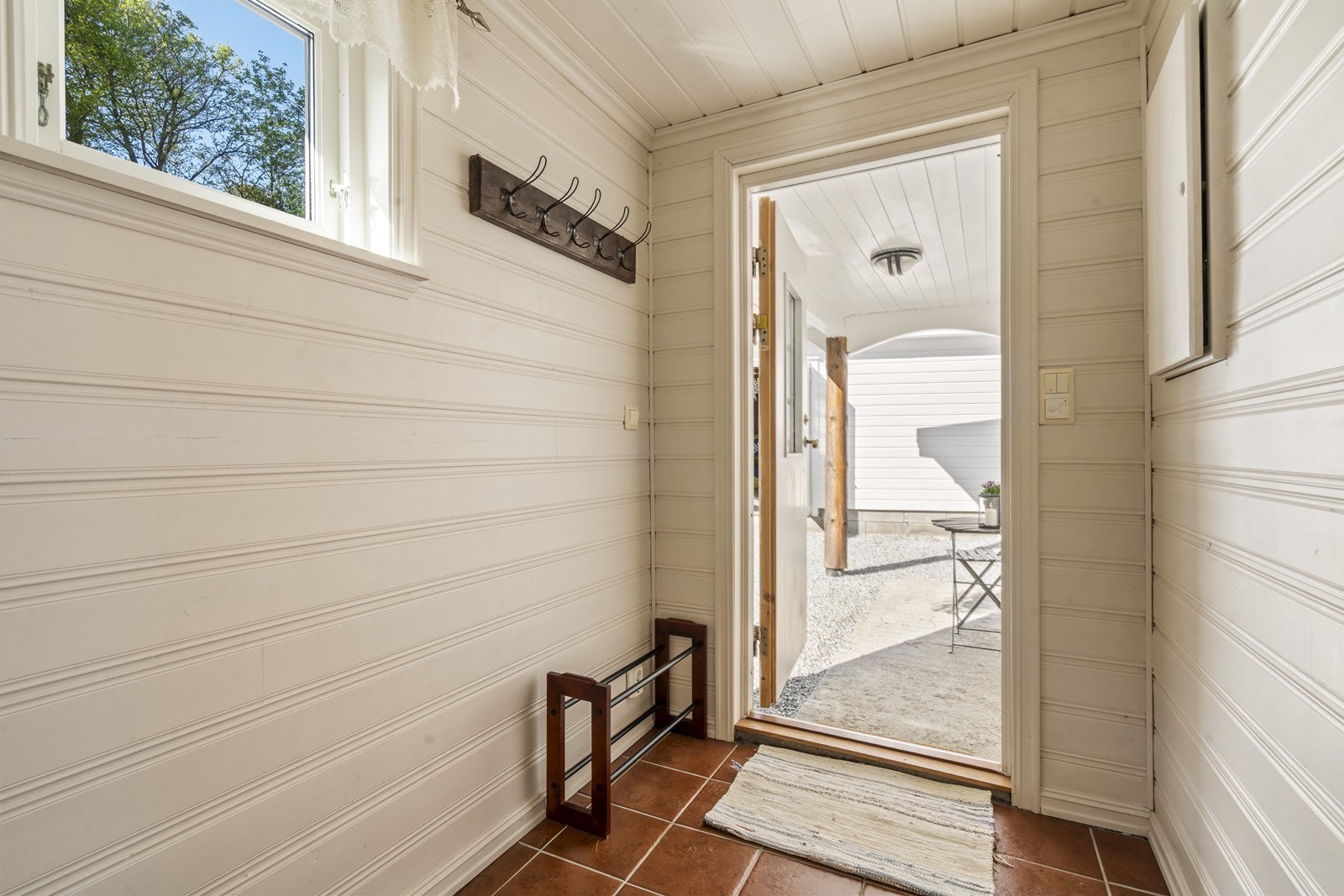 Entre/gang til å henge av seg yttertøy Galleribilde