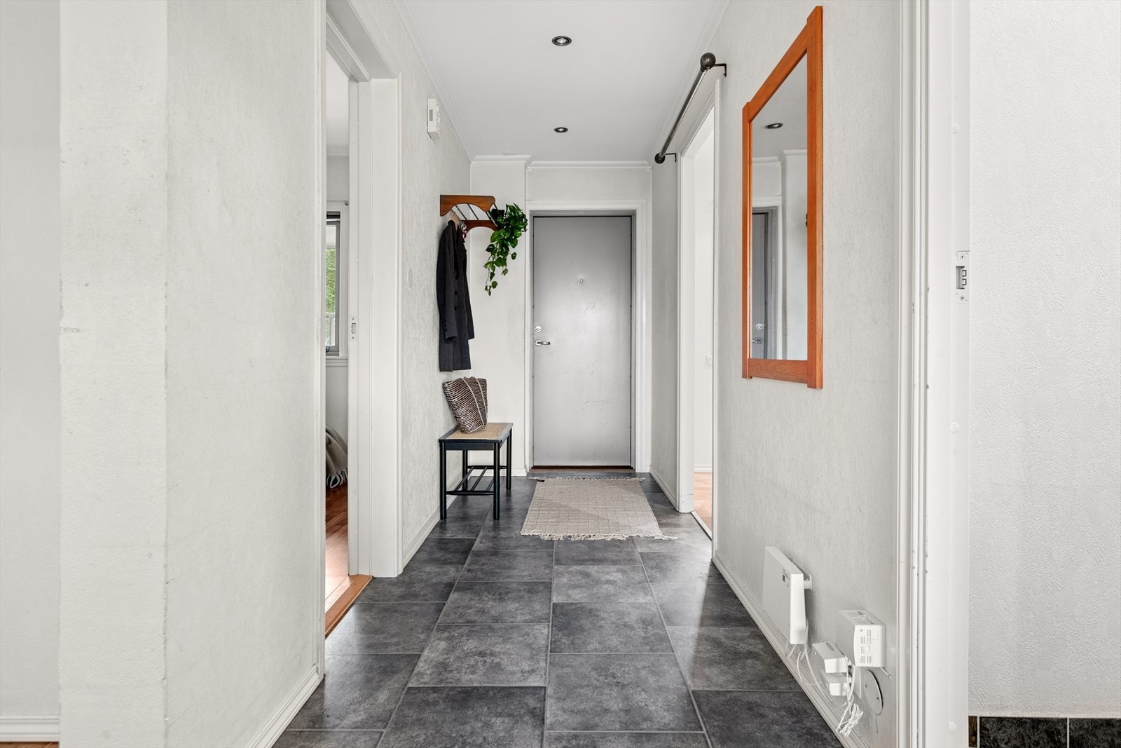 Entreen er flislagt. Galleribilde