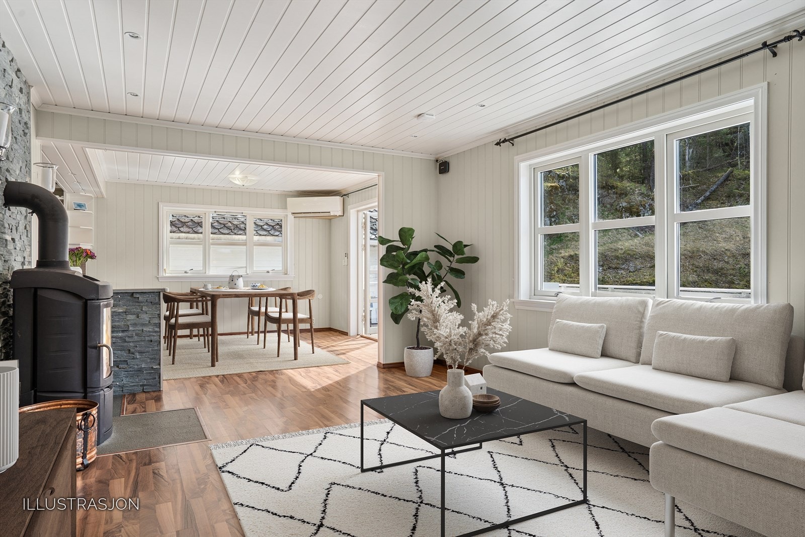 Stuen er lys og luftig, her ser du en illustrasjon av alternativ møblering i stuen. Store vinduer sørger for godt med lys! Galleribilde