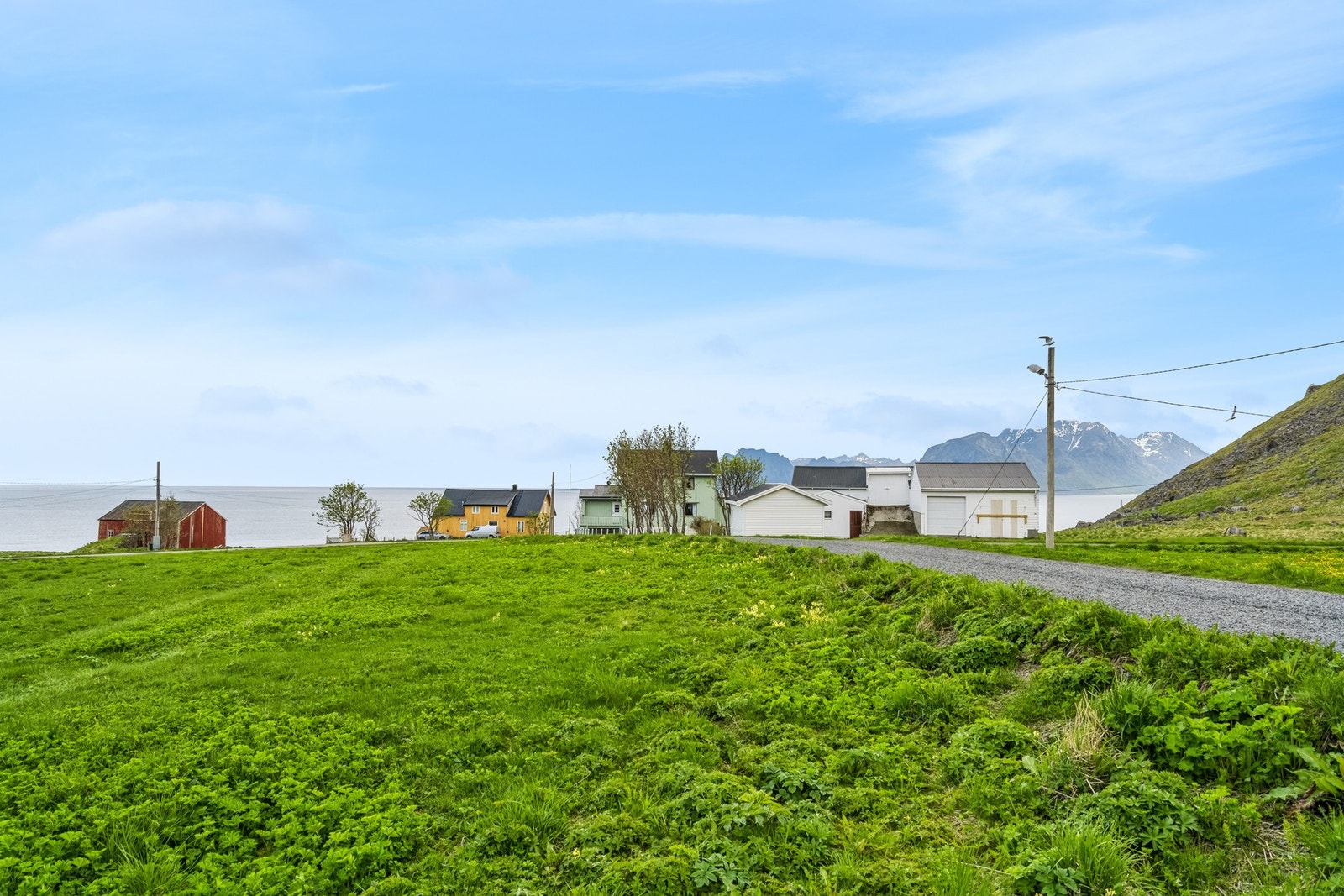 De åpne gresslettene mykner opp landskapet og skaper en innbydende atmosfære. Galleribilde