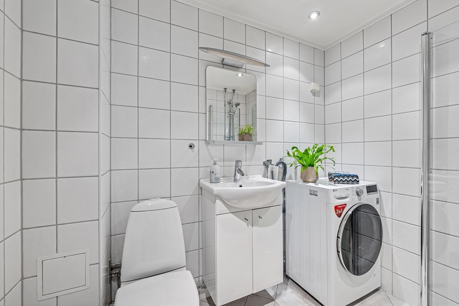 Flislagt baderom som ble totalrenovert i 2006 i regi av borettslaget. Galleribilde