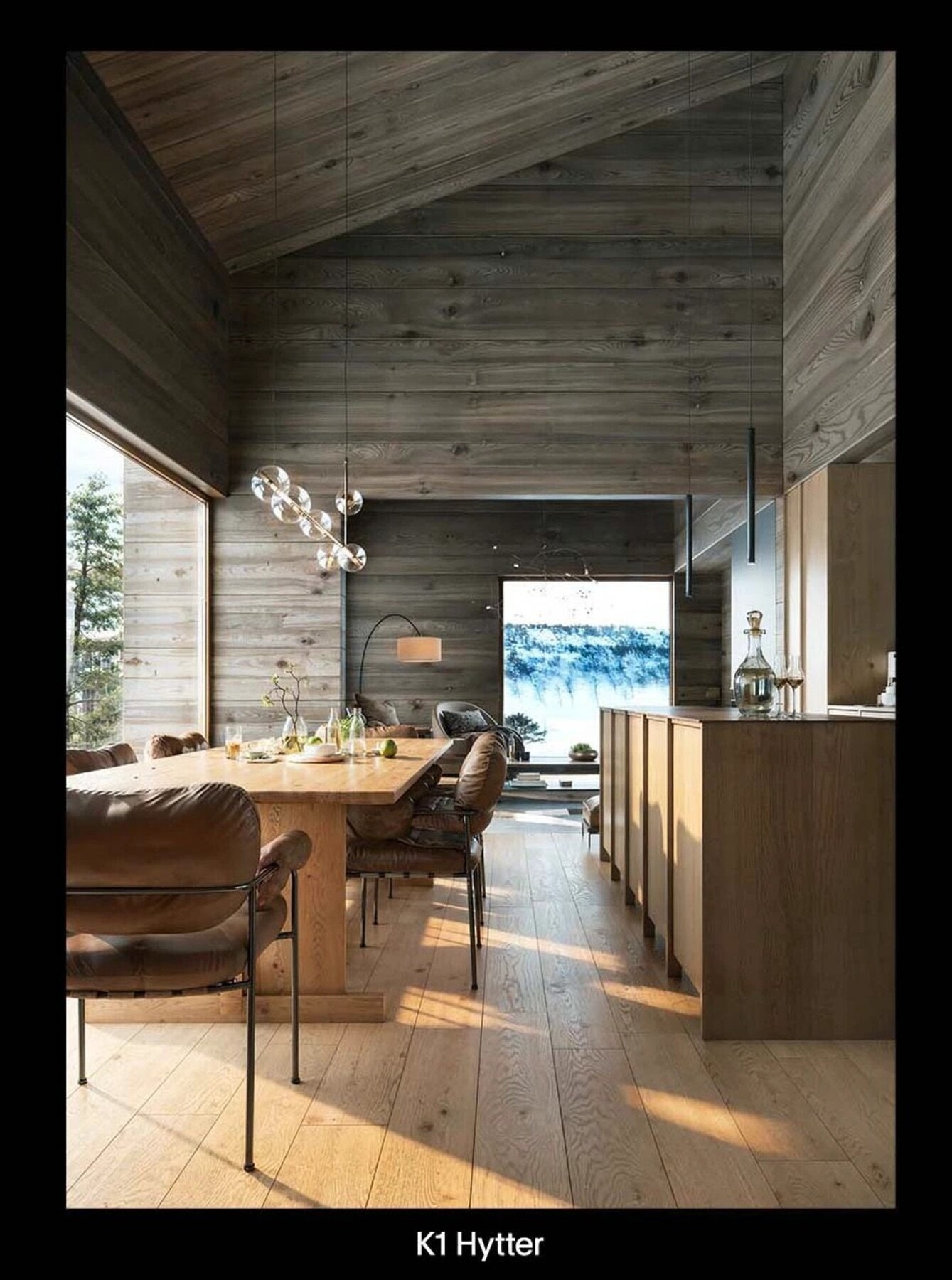 Kjøkkenøyen er strategisk plassert slik at du kan lage mat mens du nyter utsikten og har nærhet til både gjester og familie. Galleribilde