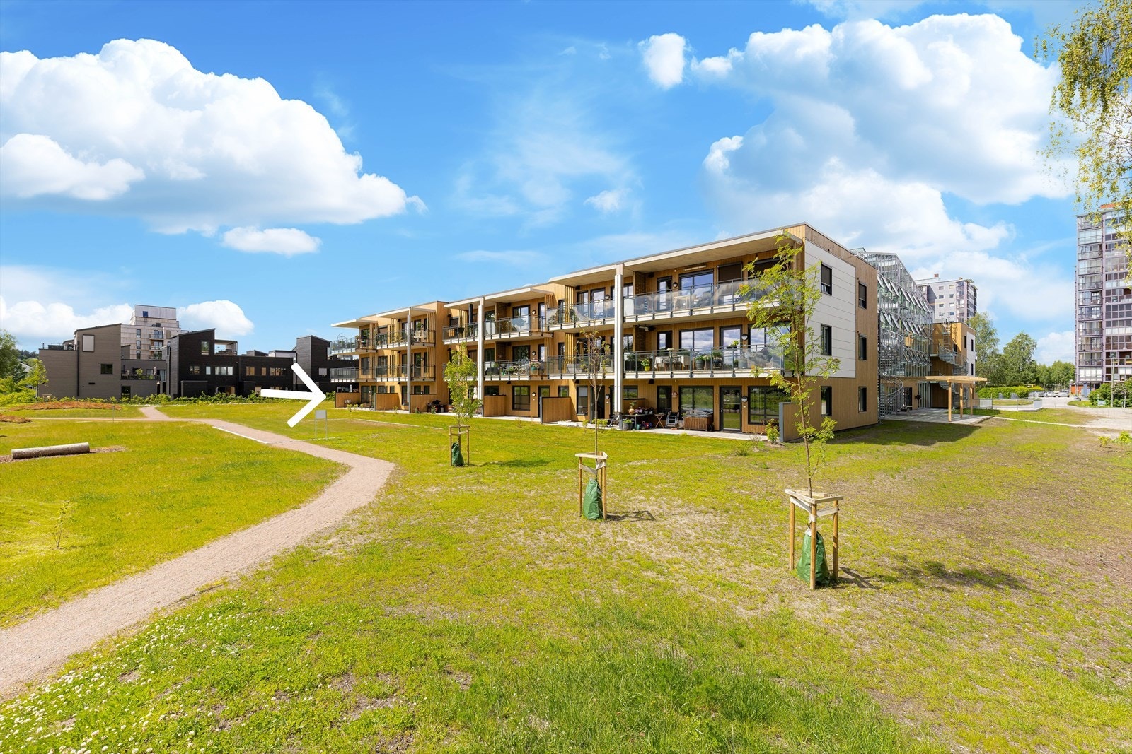 Fasade. Pilen markerer leilighetens beliggenhet Galleribilde