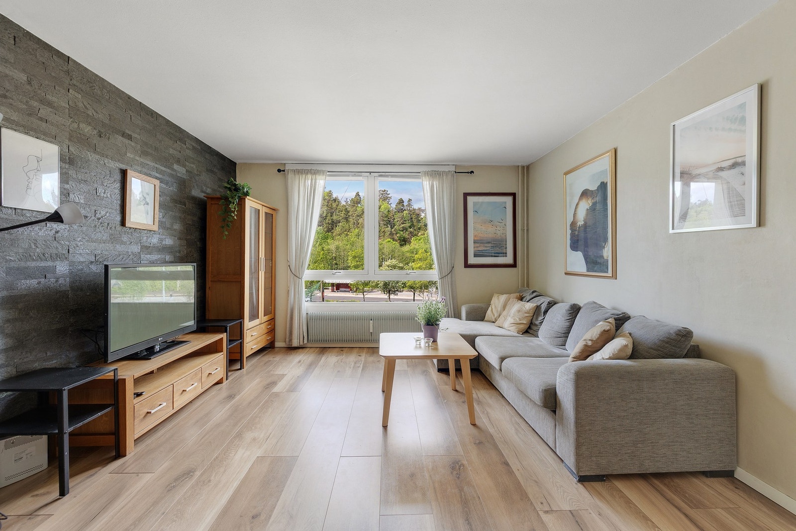 Dette er en lys 3-roms leilighet Galleribilde