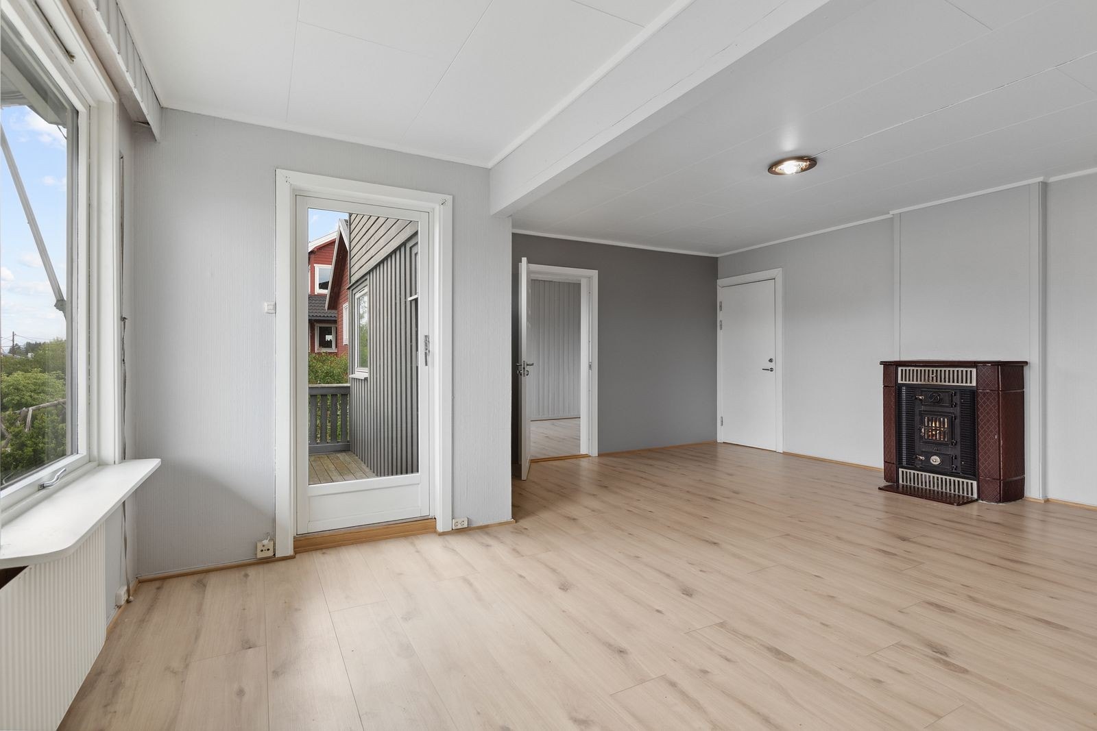 Stue med vedovn Galleribilde