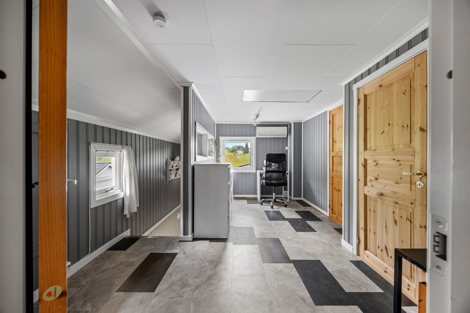 Her er det inngang til boligens tre soverom. Galleribilde