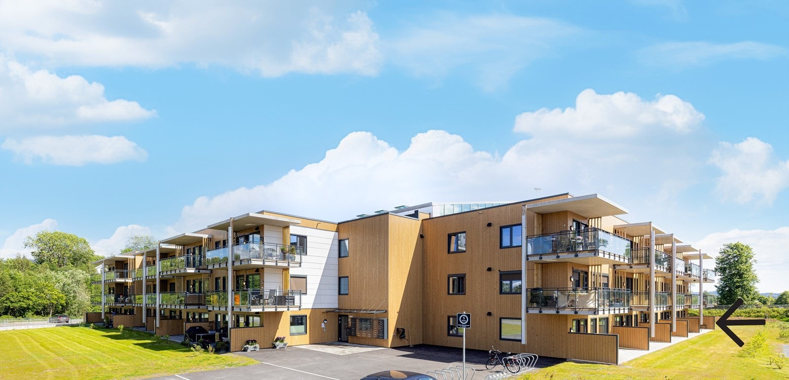 Fasade - pilen markerer leilighetens beliggenhet Galleribilde