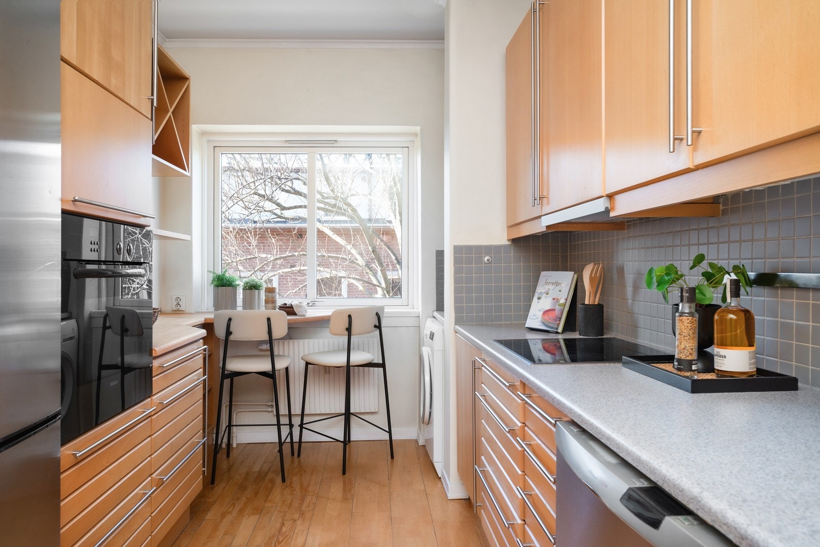 Leiligheten har et kjøkken i eget rom Galleribilde