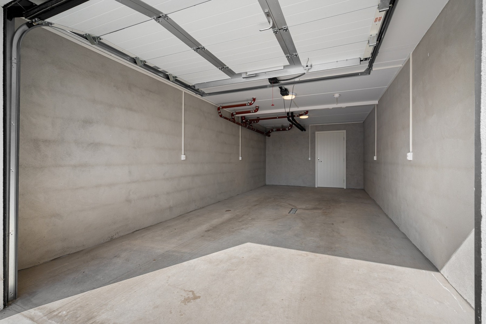 Seksjonen kommer også med egen garasje og sportsbod Galleribilde