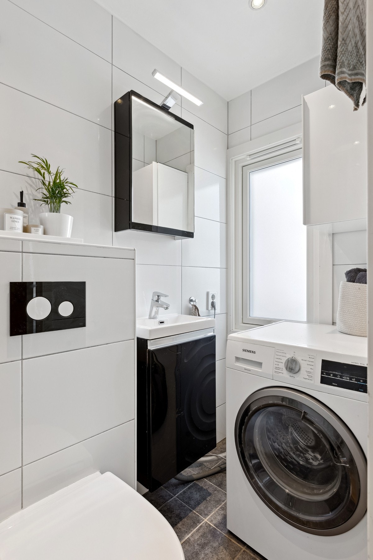 Flislagt bad med gulvvarme. Galleribilde