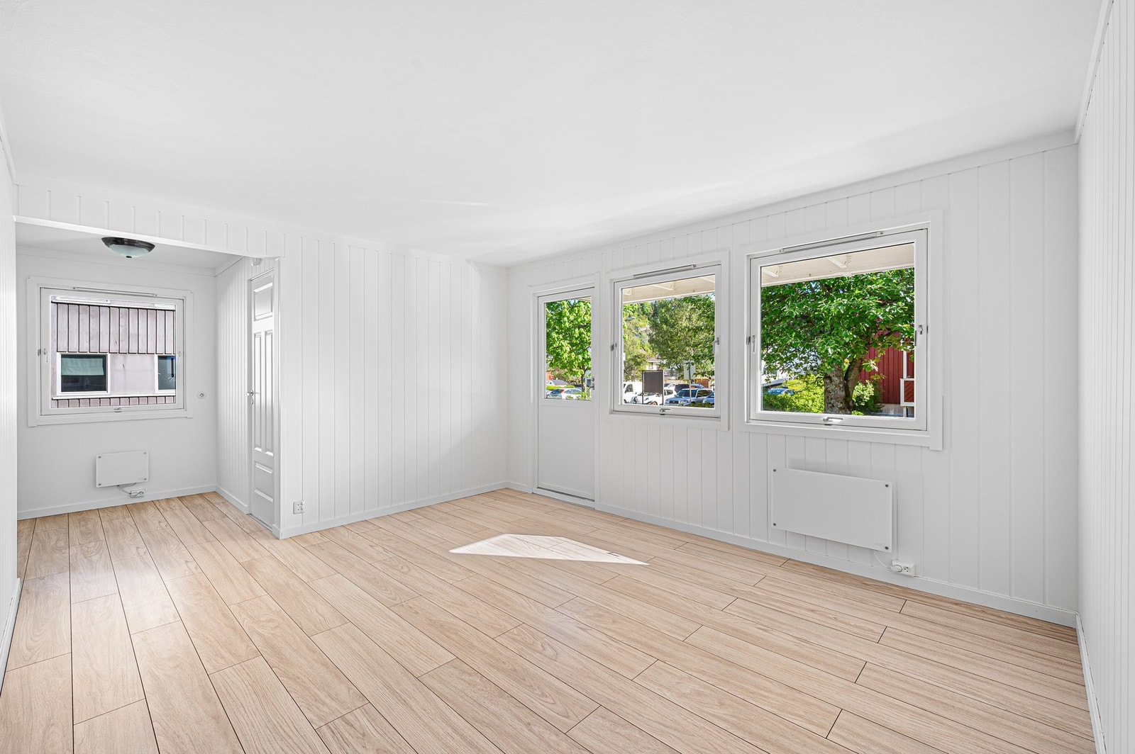 Stuen måler hele 15 m² med en god planløsning som er enkel å møblere etter eget ønske. Galleribilde
