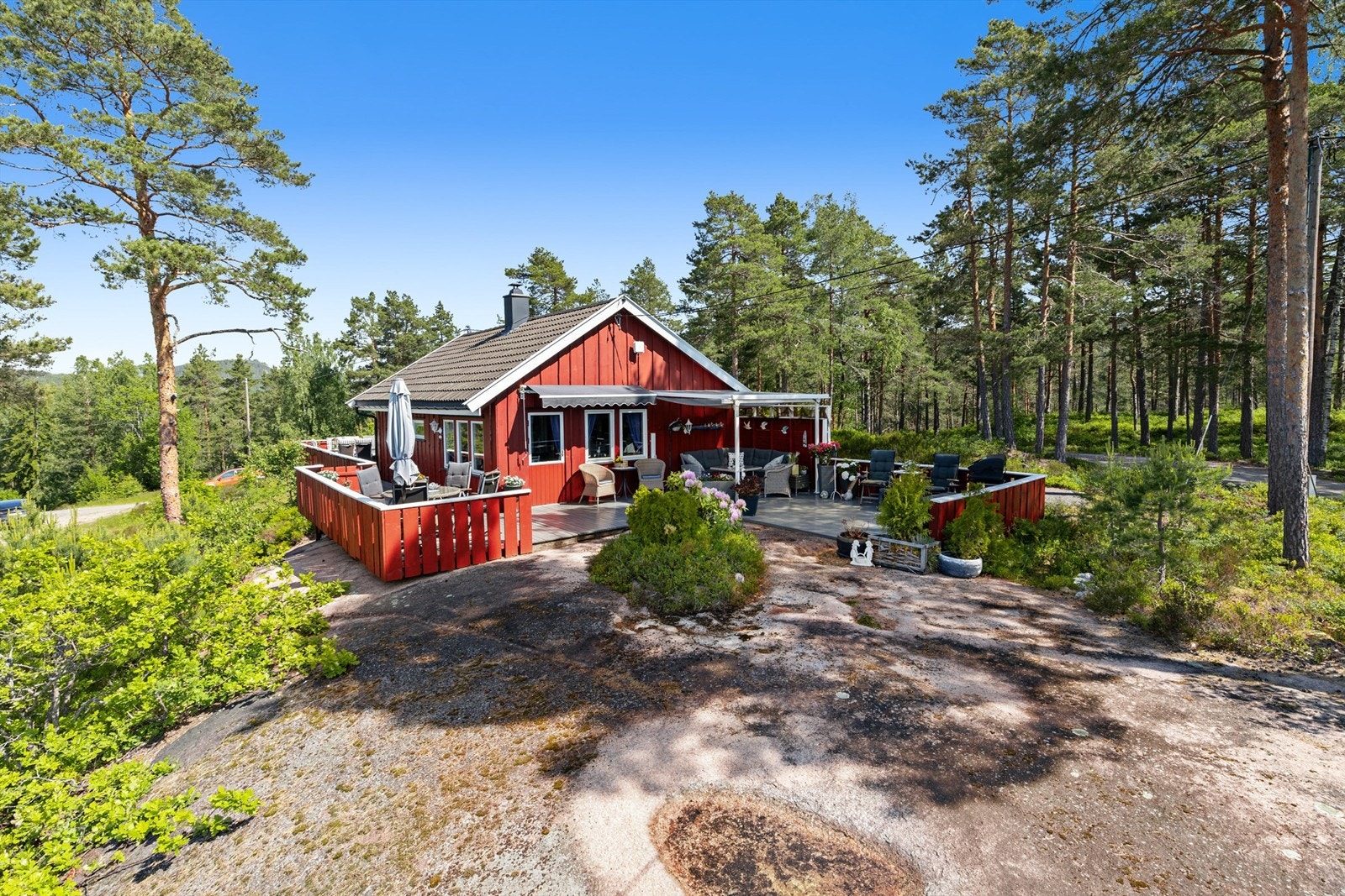 Denne hytta ligger fint til på populære Flatåsen II - som er et etablert hyttefelt utviklet fra 1990-tallet Galleribilde