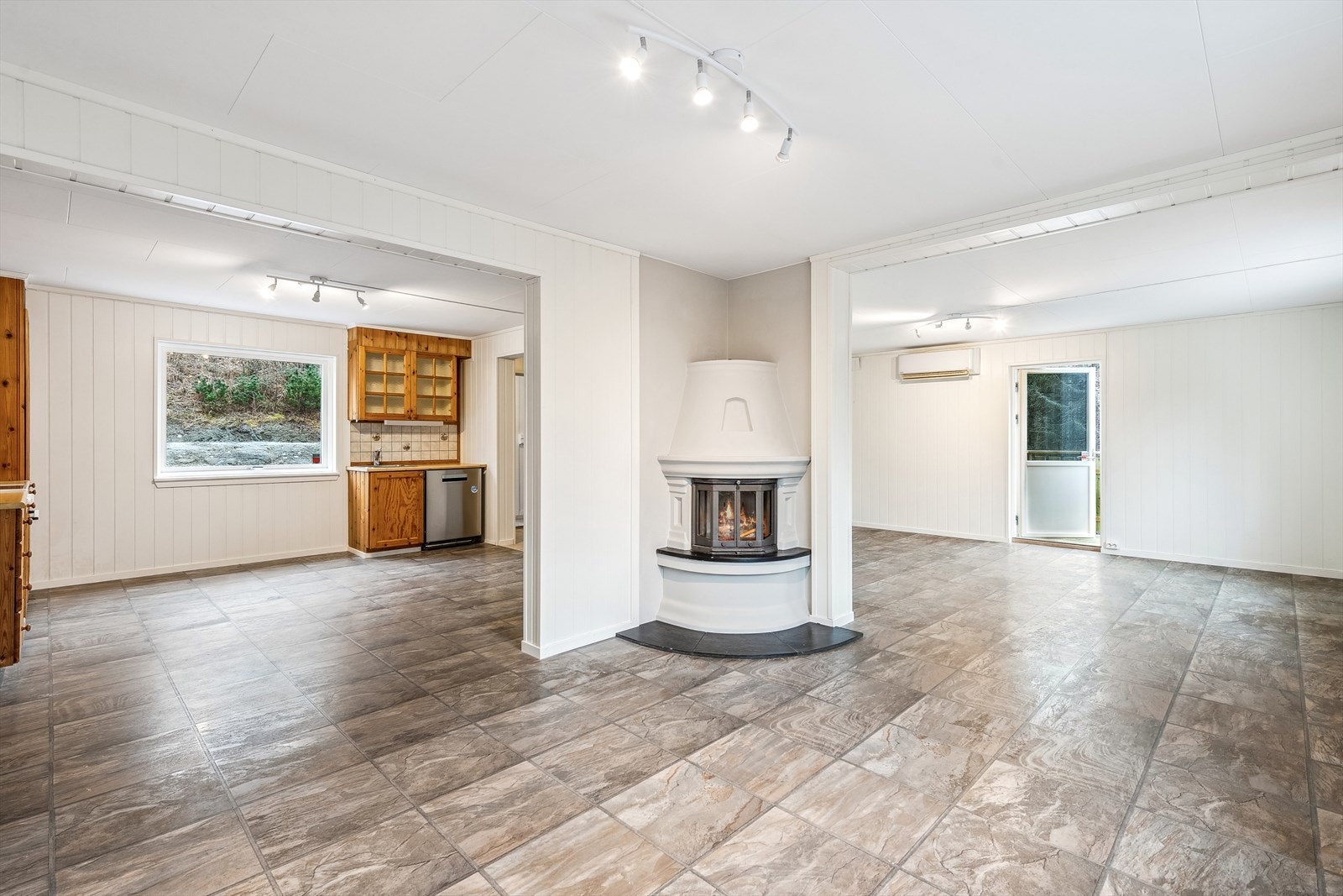 Peis i stuen gir en lun og koselig stemning. Galleribilde