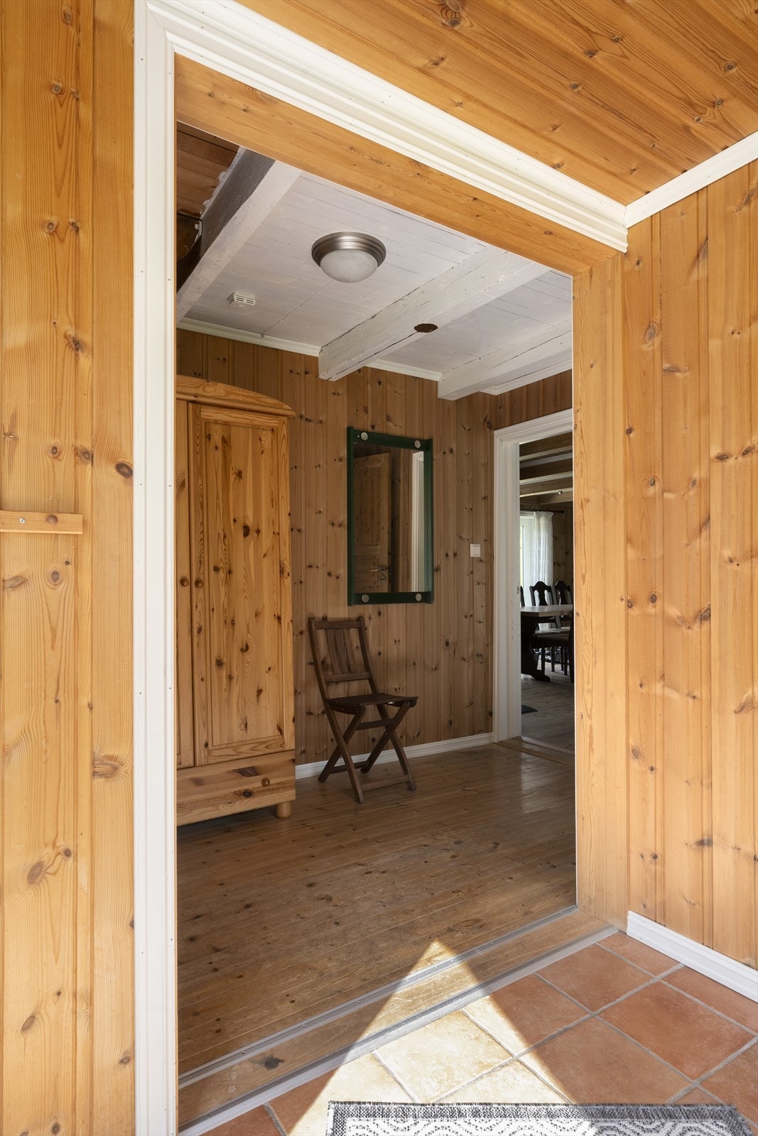 Flislagt golv i entrèen Galleribilde