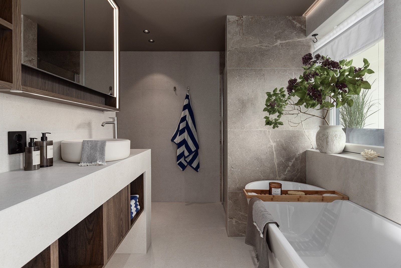 Hoved baderom strekker seg over 5,7m², alt nytt i 2025. Baderomsmøbleringen som er utført i treverk gir baderommene en lunt og godt preg. Galleribilde