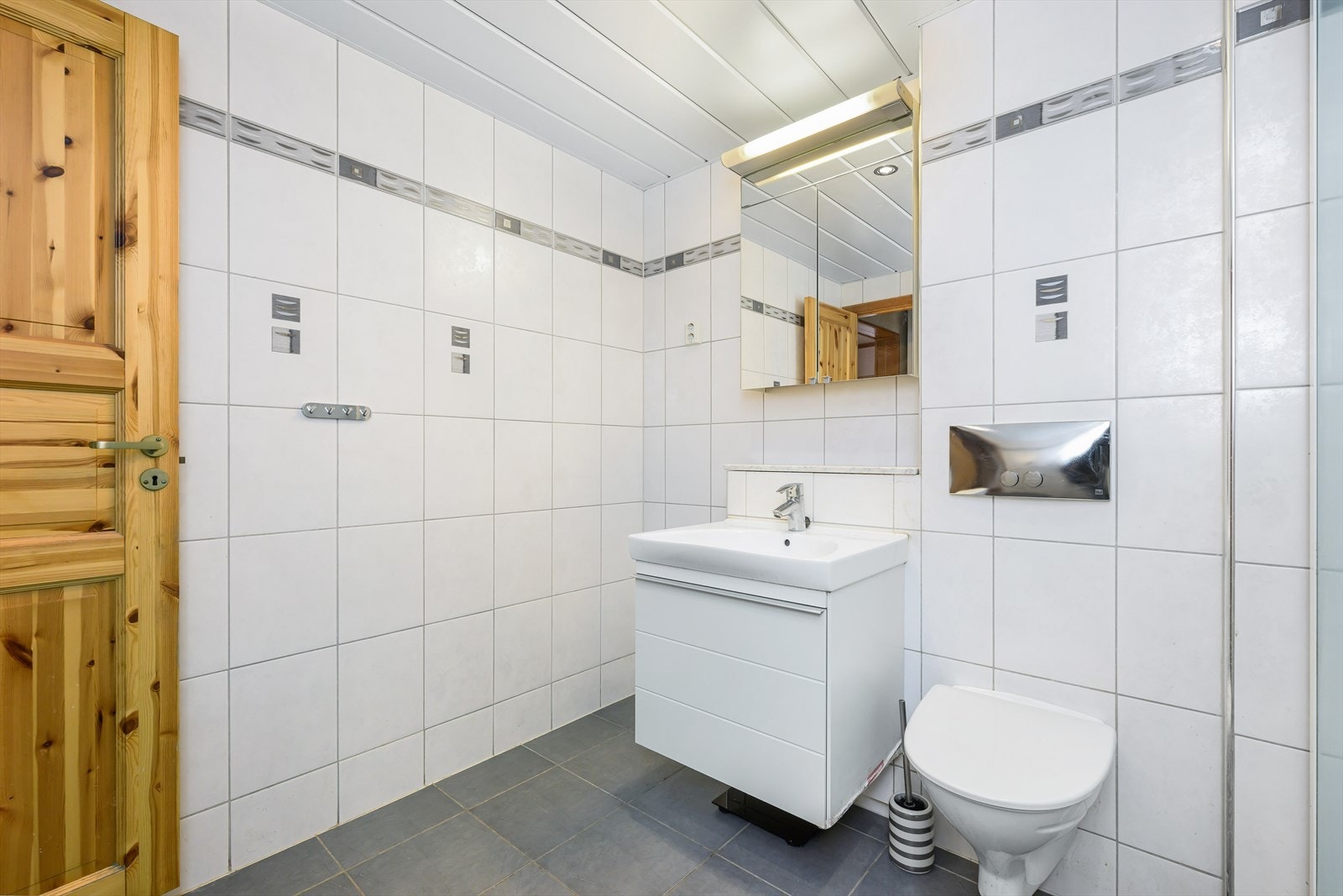 Her er det plass og opplegg for vaskemaskin og tørketrommel. Galleribilde