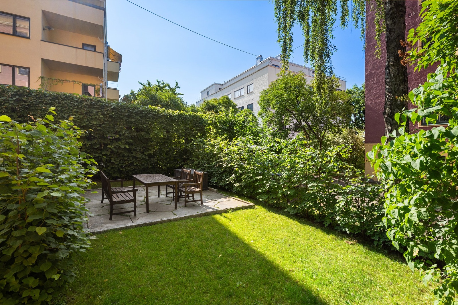 Sameiets skjermede og frodige fellesarealer Galleribilde