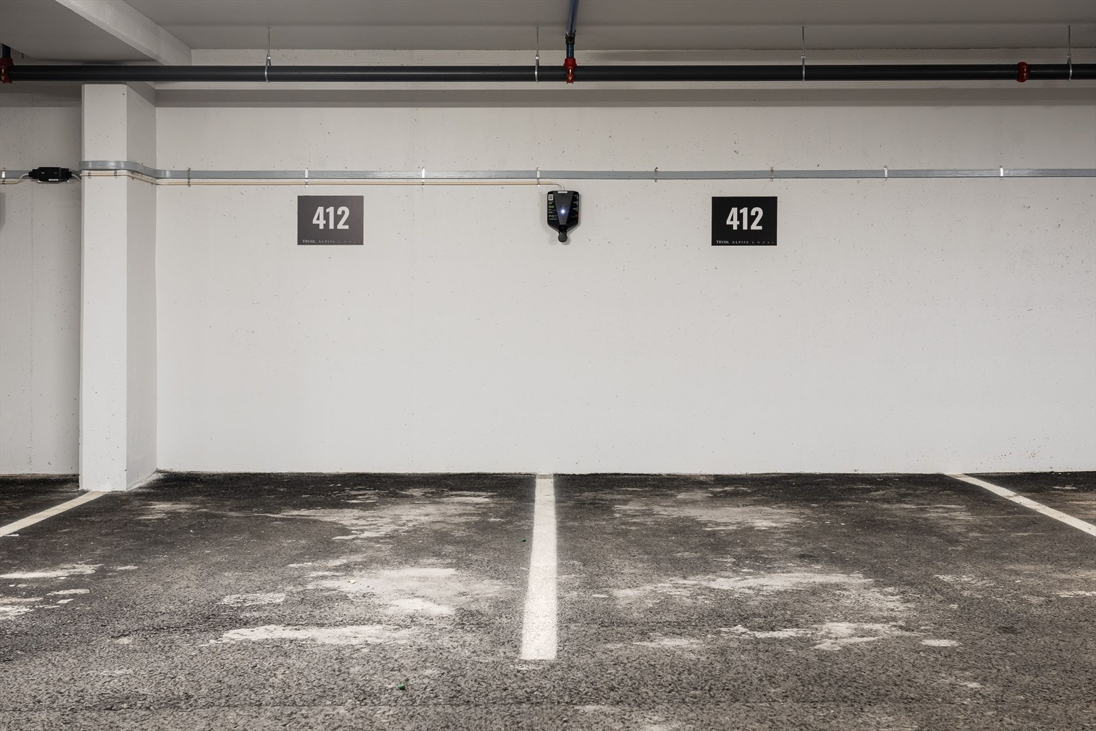 Med leiligheten følger rettighet til 2 garasjeplasser med elbil-lader i felles garasjeanlegg. Galleribilde