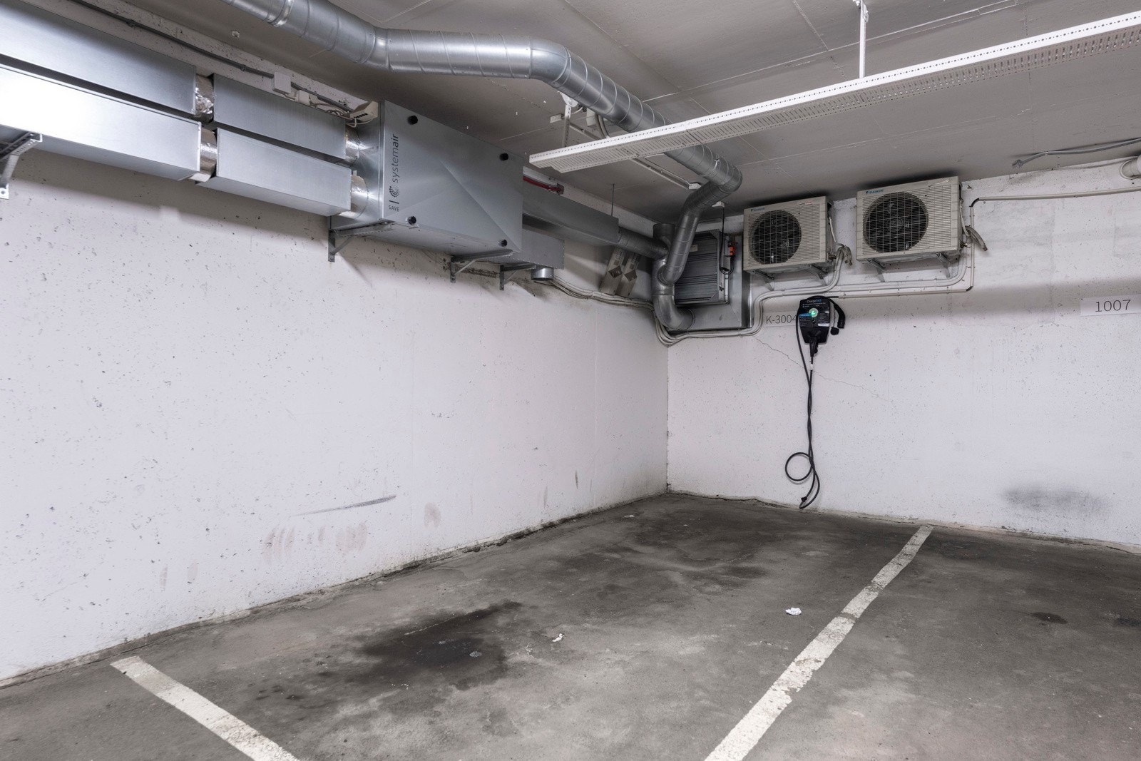 Til leiligheten følger egen garasjeplass i felles garasjeanlegg U2 Galleribilde