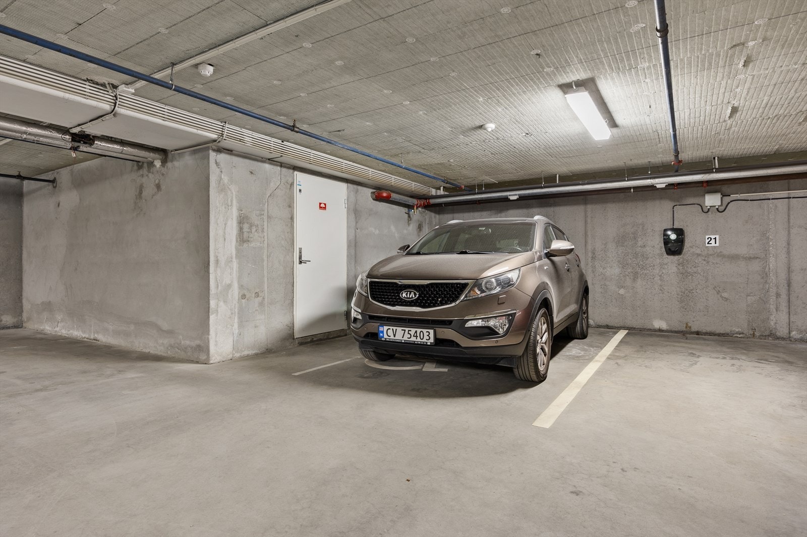 Egen parkeringsplass i felles parkeringskjeller gir trygg og komfortabel parkering. Galleribilde