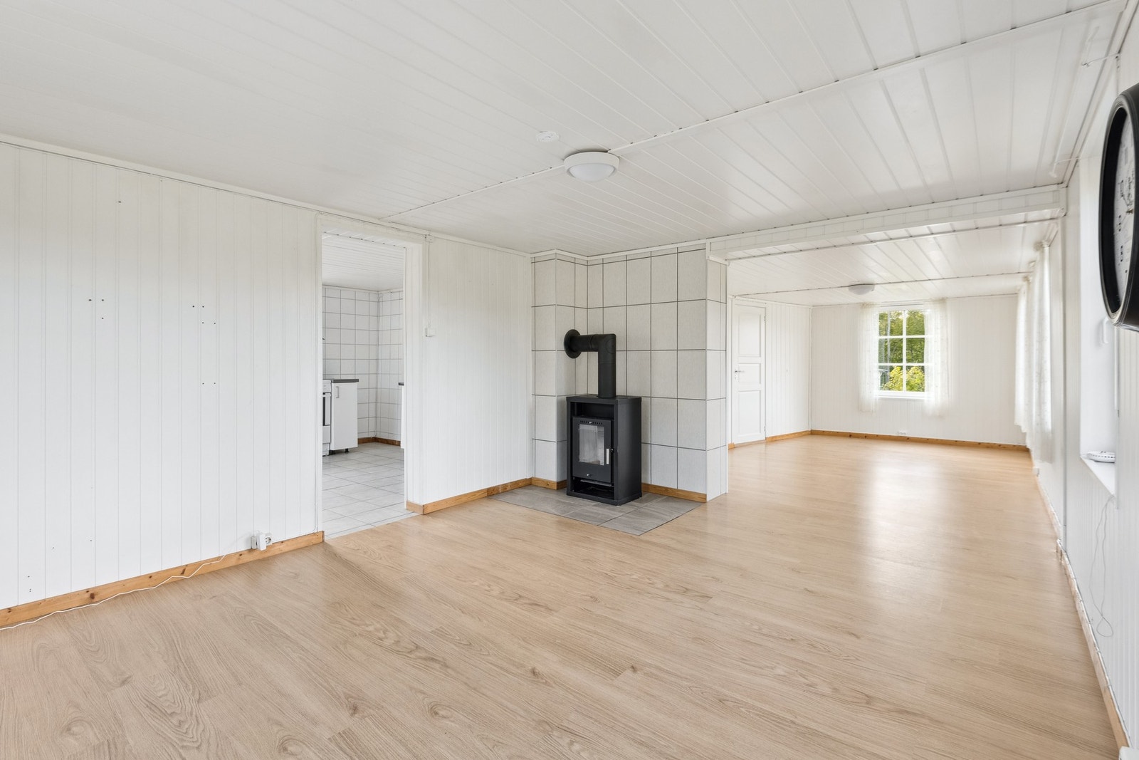 Her kan man nyte kalde høstkvelder foran vedovnen. Galleribilde