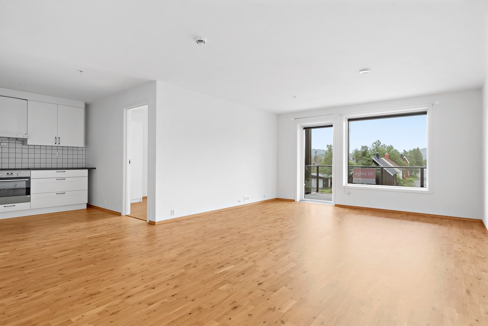 Stue med åpen løsning til kjøkken Galleribilde