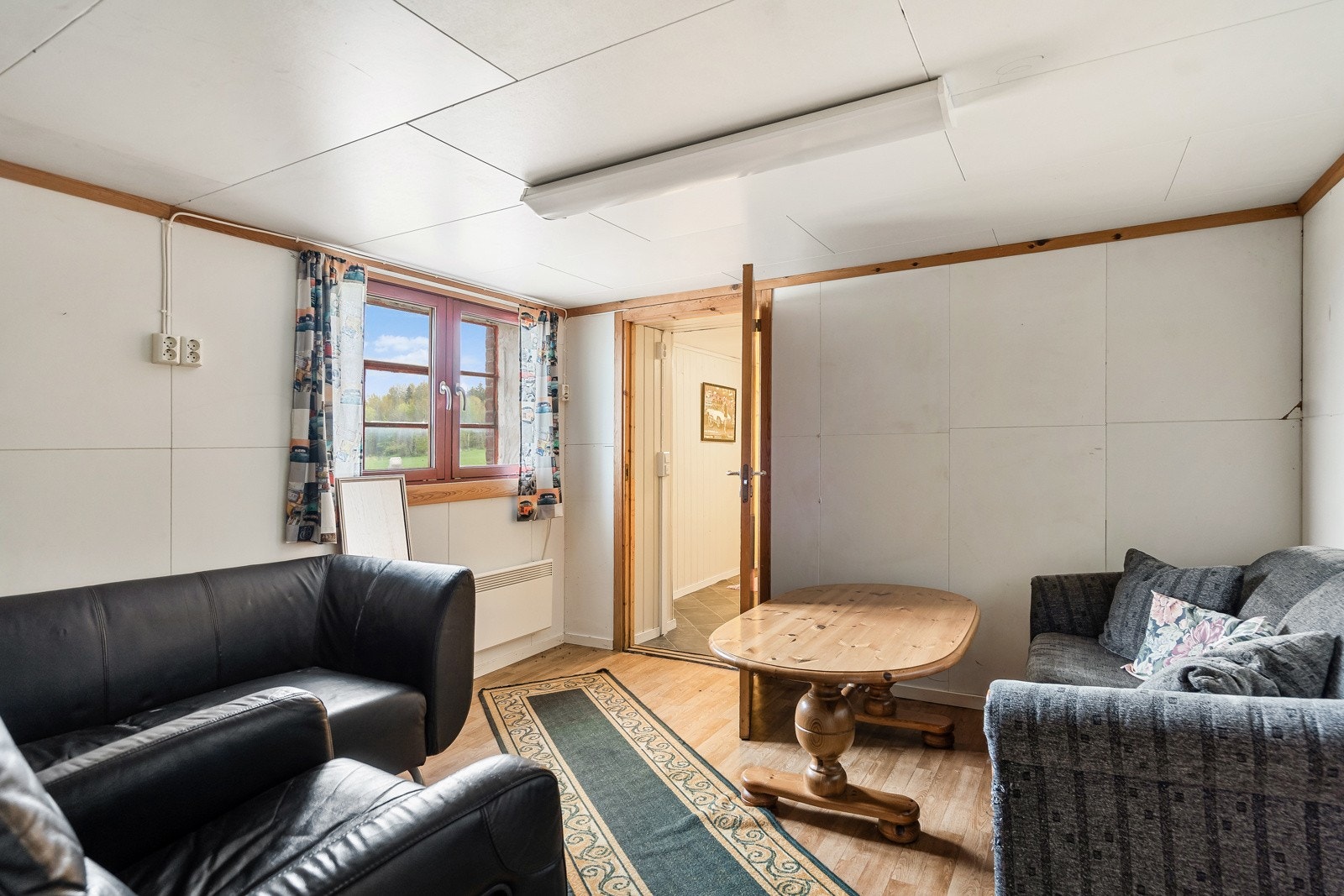 Stue innredet innerst i låven (ikke søkt til varig opphold) Galleribilde