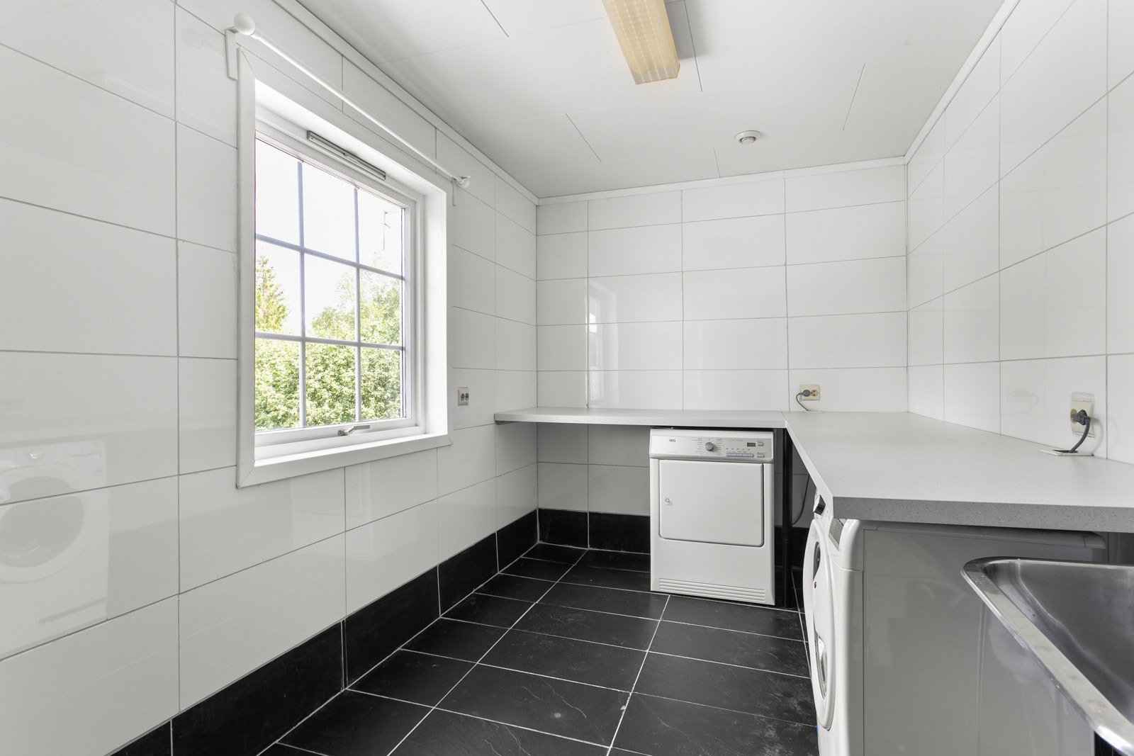 Praktisk vaskerom i 1. etasje. Galleribilde