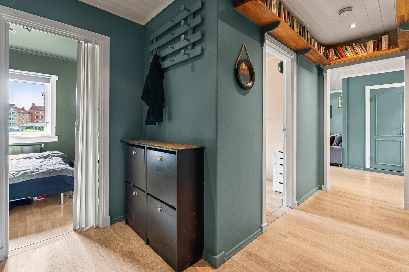 Gangen gir også oppbevaringsmuligheter Galleribilde